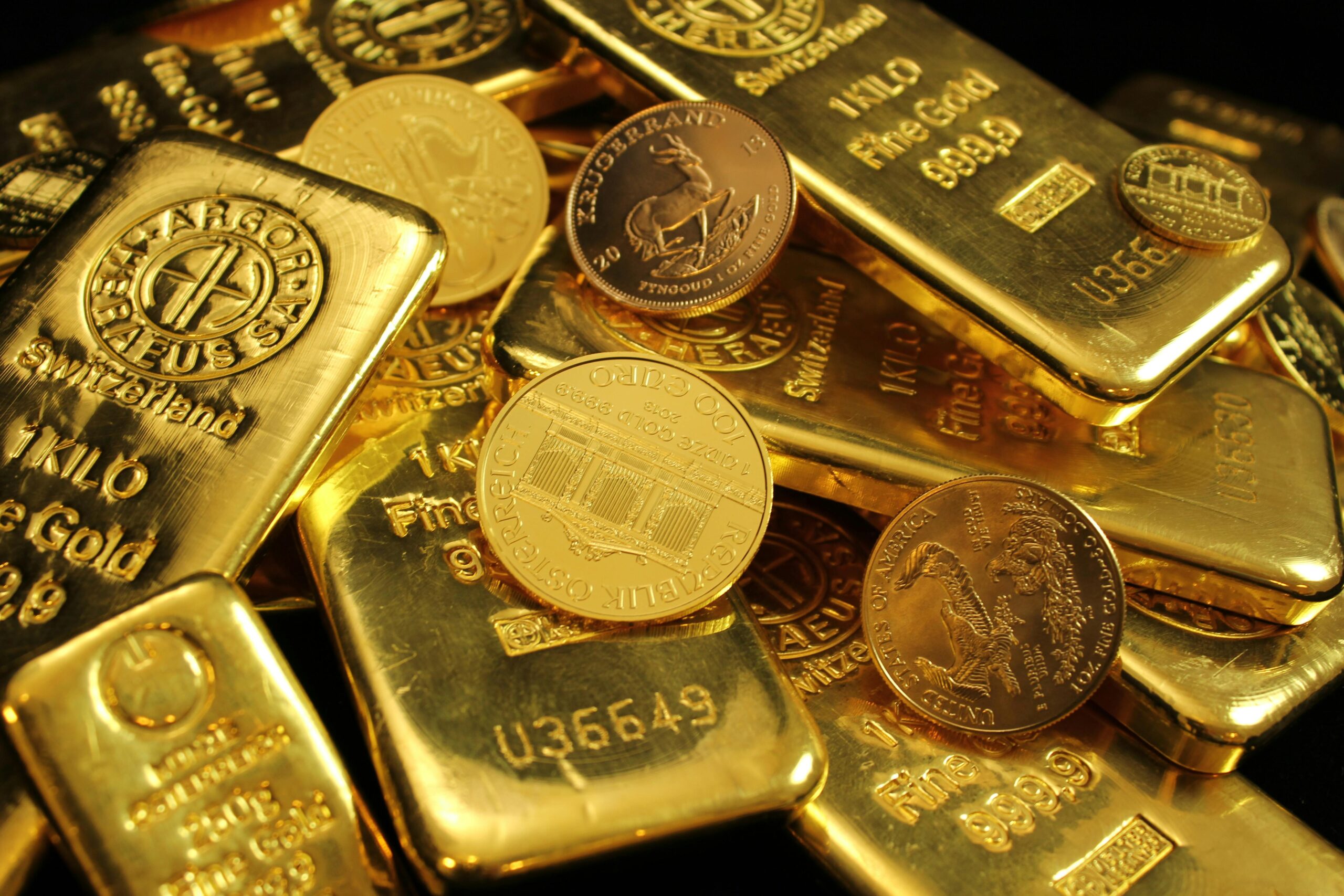 Home Detailed close-up of gold bars and coins, symbolizing wealth and investment. Perfect for financial imagery.